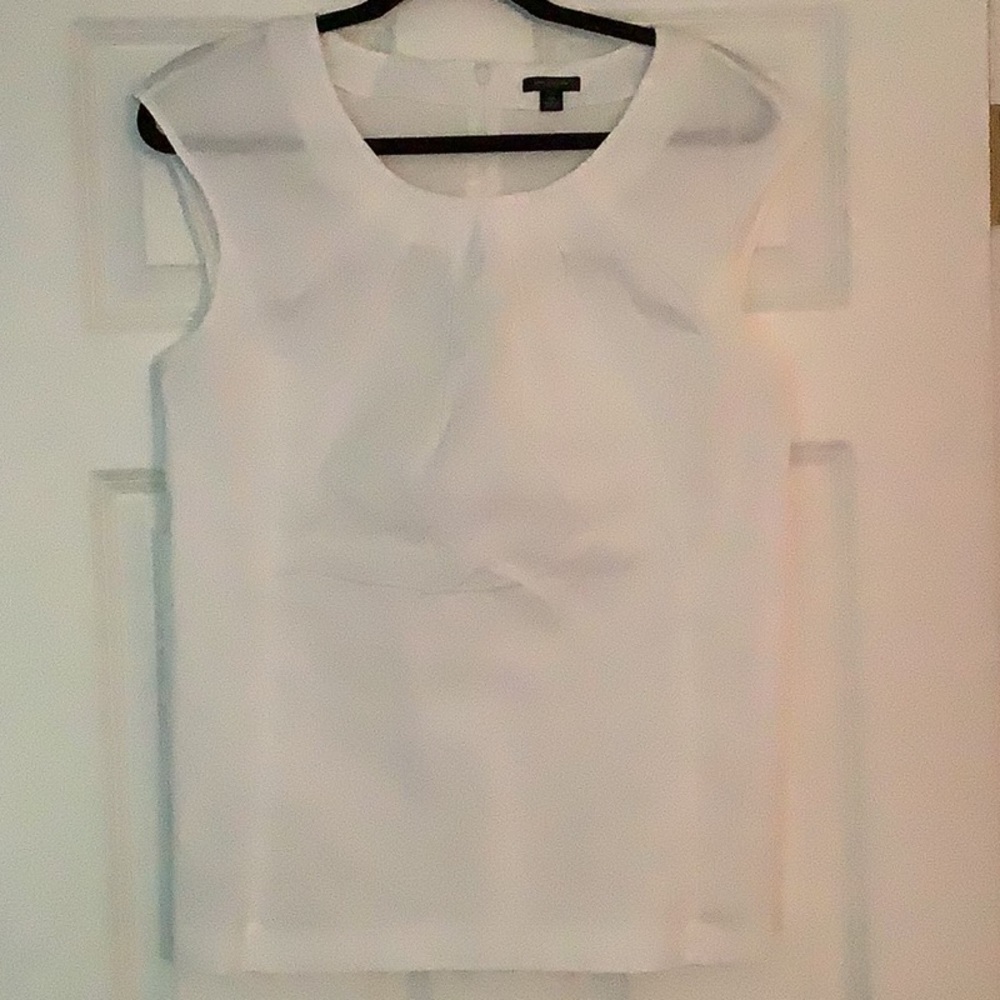 White sleeveless blouse